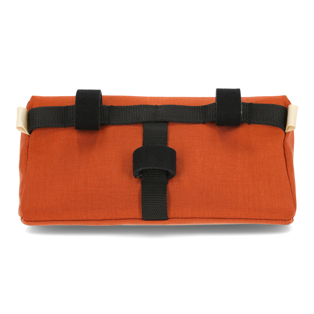 Topo Designs Bike Bag Mountain in Blue/Clay. Image shows the back of the bag with black velcro. Shown on a white background.