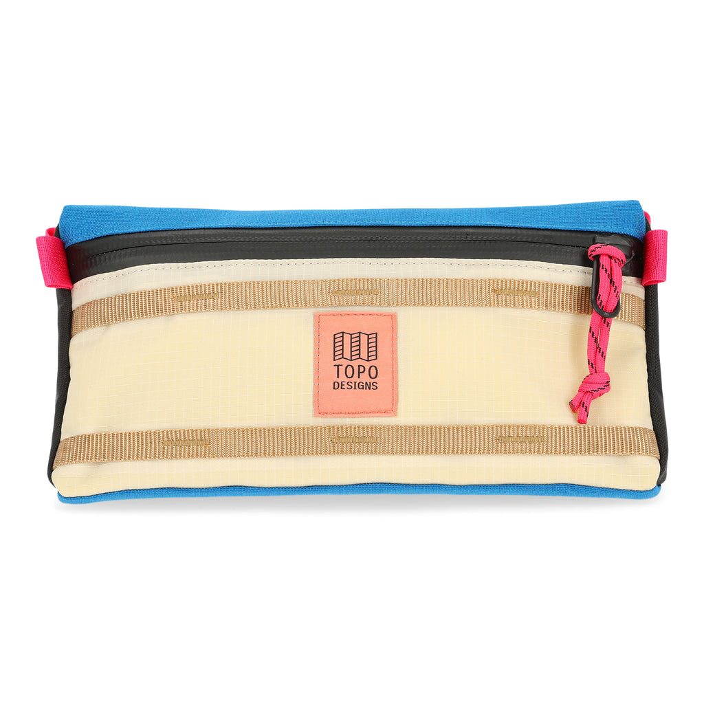 Topo Designs Bike Bag Mountain in Bone White/Blue. Bag is triangle shaped with multiple colors of webbing and nylon and a waterproof zipper. Shown on a white background.